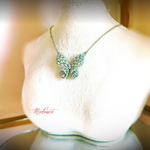 Necklace on a mannequin with a blurred background